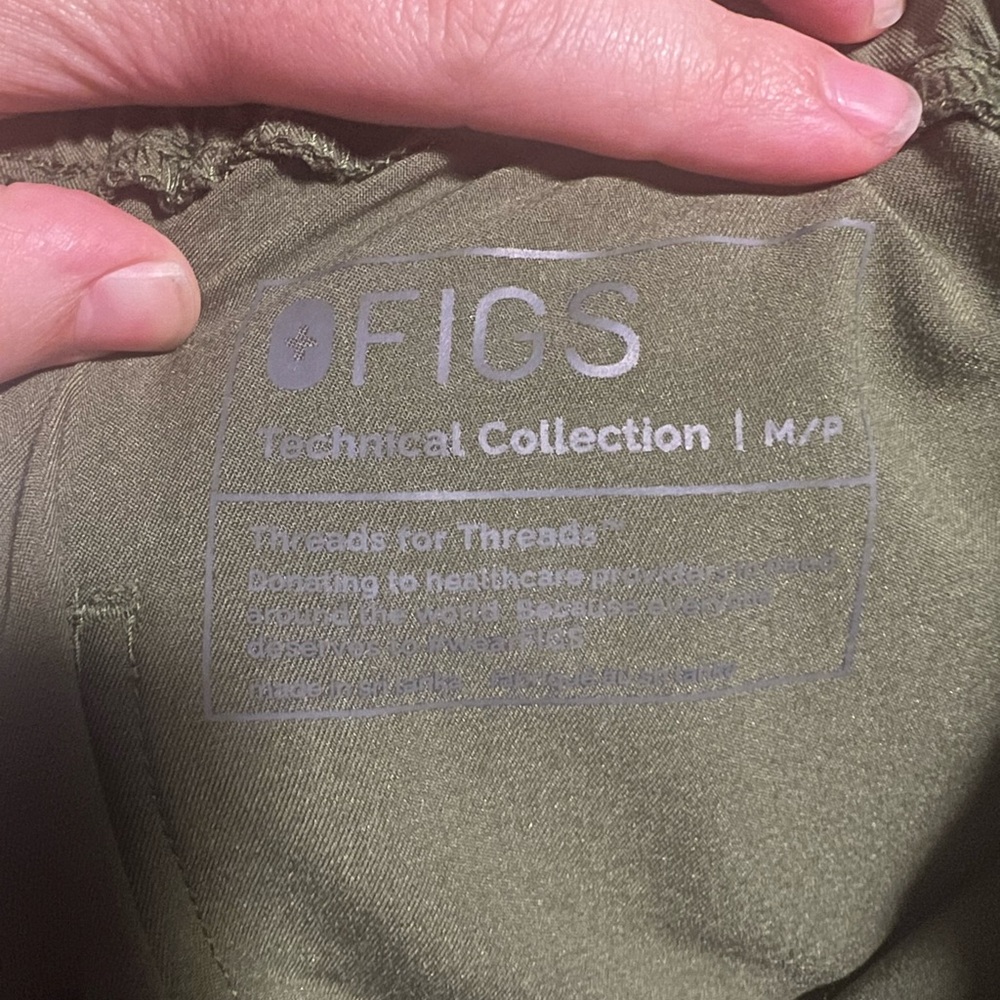 Size medium technical FIGS. No rips, stains, or any other signs of wear.